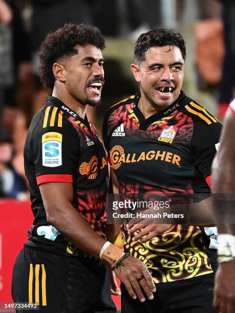 Etene Nanai-Seturo of the Chiefs celebrates scoring a try with Anton Lienert-Brown of the Chiefs during the Super Rugby Pacific Quarter Final match...