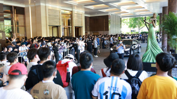 Fans wait for the arrival of Lionel Messi at a hotel ahead of 2023 International Football Invitation match between Argentina and Australia on June...