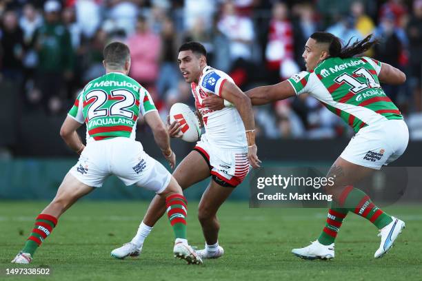 Tyrell Sloan of the Dragons is tackled during the round 15 NRL match between St George Illawarra Dragons and South Sydney Rabbitohs at Netstrata...