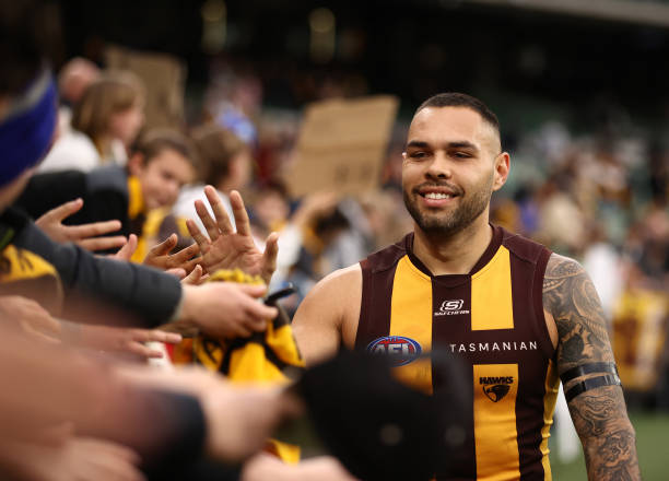 Jarman Impey of the Hawks celebrates after the Hawks defeated the Lions during the round 13 AFL match between Hawthorn Hawks and Brisbane Lions at...