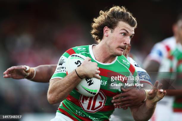 Campbell Graham of the Rabbitohs is tackled during the round 15 NRL match between St George Illawarra Dragons and South Sydney Rabbitohs at Netstrata...