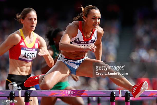 Jessica Ennis of Great Britain competes in the Women's Heptathlon 100m Hurdles Heat 1 on Day 7 of the London 2012 Olympic Games at Olympic Stadium on...