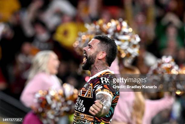 Adam Reynolds of the Broncos celebrates after scoring a try during the round 15 NRL match between Brisbane Broncos and Newcastle Knights at Suncorp...
