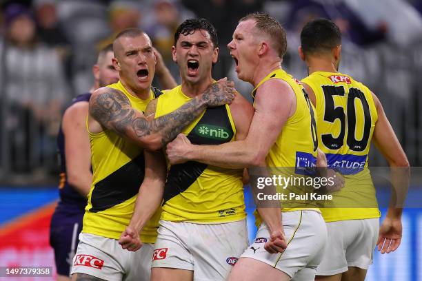 Tim Taranto of the Tigers celebrates a goal during the round 13 AFL match between Fremantle Dockers and Richmond Tigers at Optus Stadium, on June 10...