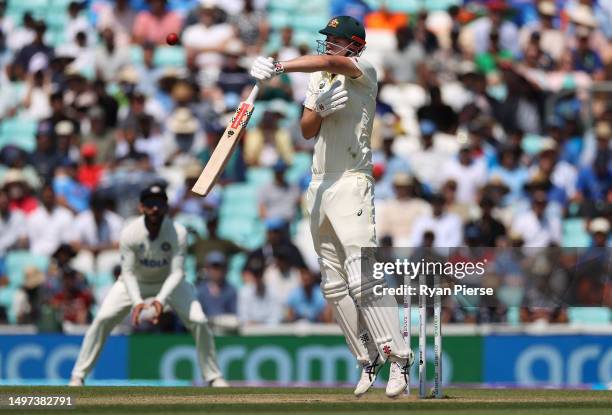 Cameron Green of Australia is stuck by a delivery from Mohammed Siraj of India during day four of the ICC World Test Championship Final between...