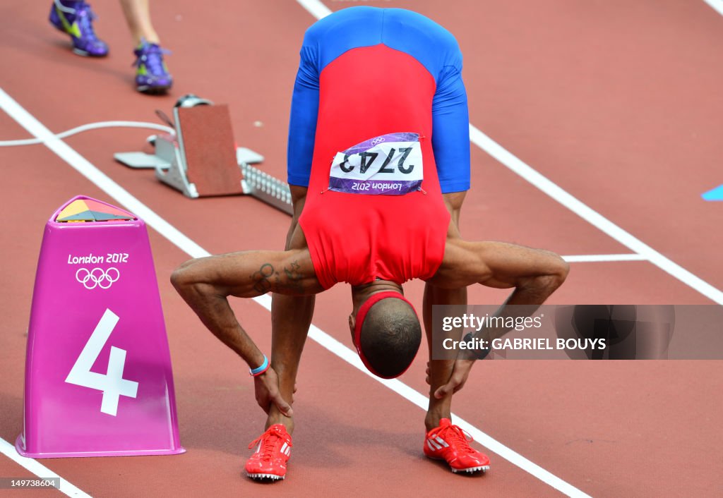 Culson Puerto Rico's Javier Culson stretches before competing in the men's ...