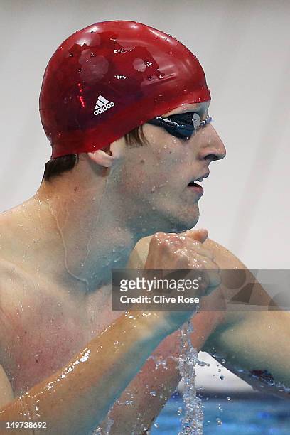 Adam Brown of Great Britain reacts after Great Britain won the Men's 4x100 Medley Relay heat 1 on Day 7 of the London 2012 Olympic Games at the...