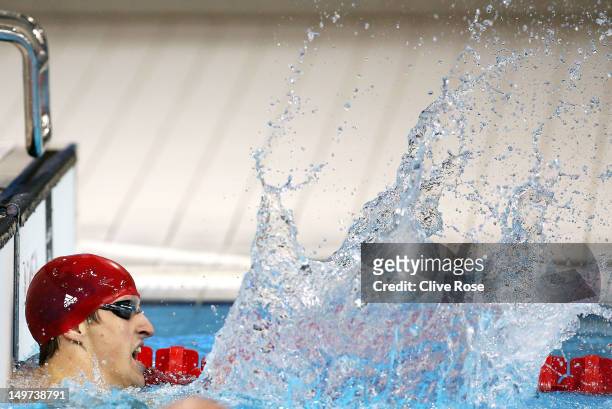 Adam Brown of Great Britain reacts after Great Britain won the Men's 4x100 Medley Relay heat 1 on Day 7 of the London 2012 Olympic Games at the...