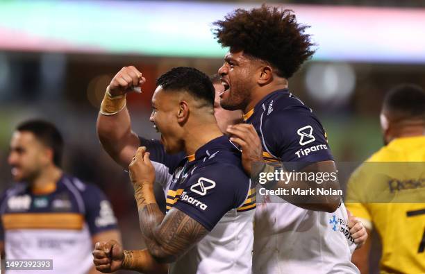 Brumbies players celebrate winning the Super Rugby Pacific Quarter Final match between Brumbies and Hurricanes at GIO Stadium, on June 10 in...