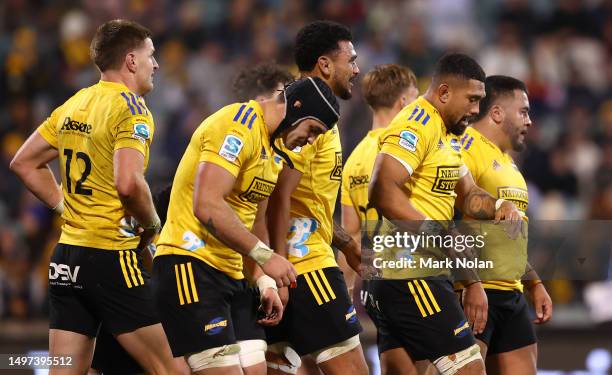 Hurricane players look dejected after the Super Rugby Pacific Quarter Final match between Brumbies and Hurricanes at GIO Stadium, on June 10 in...