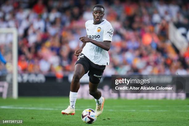 Mouctar Diakhaby of Valencia CF run with the ball during the LaLiga Santander match between Valencia CF and RCD Espanyol at Estadio Mestalla on May...