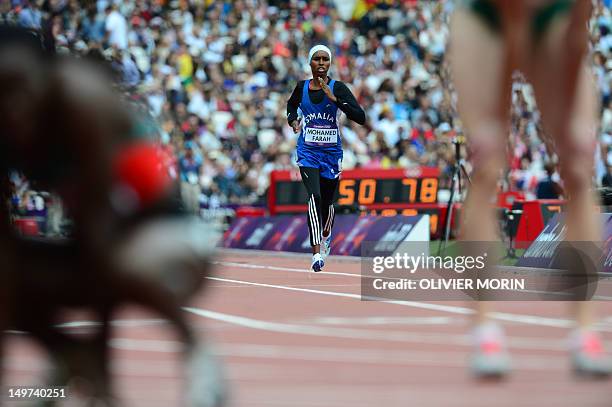 Somalia's Zamzam Mohamed Farah competes in the women's 400m heats at the athletics event during the London 2012 Olympic Games on August 3, 2012 in...