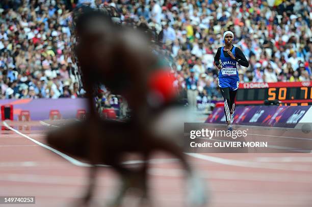 Somalia's Zamzam Mohamed Farah competes in the women's 400m heats at the athletics event during the London 2012 Olympic Games on August 3, 2012 in...