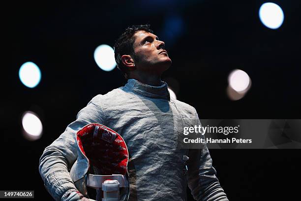 Aldo Montano of Italy waits for a decision against Aliaksandr Buikevich of Belarus during the quarterfinal Men's Sabre Team Fencing on Day 7 of the...