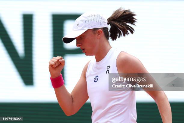 Iga Swiatek of Poland celebrates a point against Karolina Muchova of Czech Republic during the Women's Singles Final match on Day Fourteen of the...