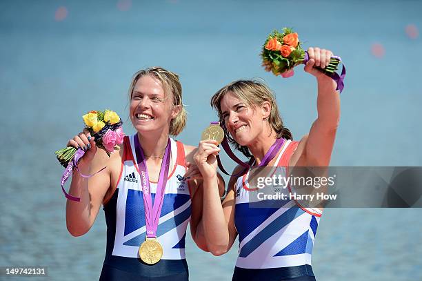 Katherine Grainger and Anna Watkins of Great Britain celebrate with their gold medals during the medal ceremony for the Women's Double Sculls final...