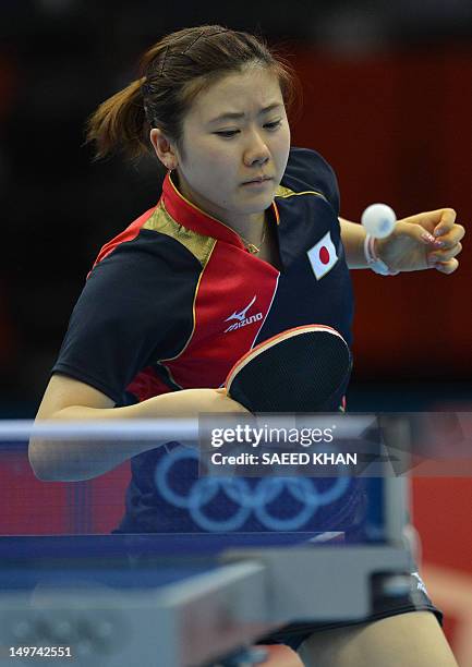 Japan's Ai Fukuhara returns a shot to Ariel Hsing of the US during their womens's team table tennis match at The Excel Centre in London on August 3...