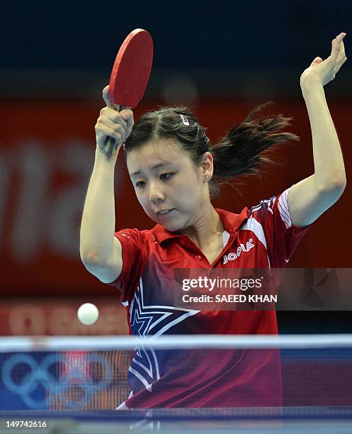 Ariel Hsing of the US returns a shot to Japan's Ai Fukuhara during their womens's team table tennis match at The Excel Centre in London on August 3...