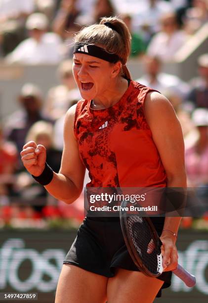 Karolina Muchova of Czech Republic celebrates a point against Iga Swiatek of Poland during the Women's Singles Final match on Day Fourteen of the...