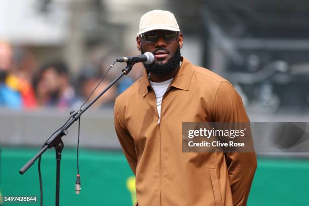 Honorary race starter, LeBron James of the United States looks on prior to waving the flag to start the 100th anniversary of the 24 Hours of Le Mans...