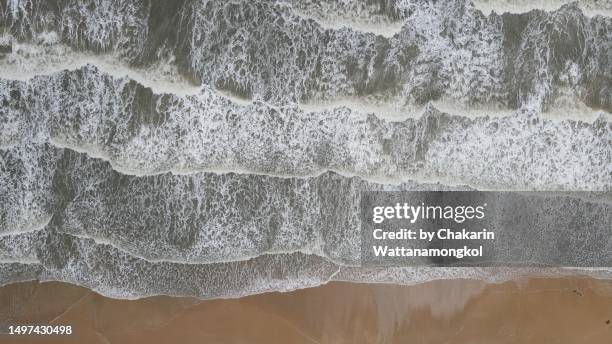 angry sea backgrounds - sea, wave and sand beach in monsoon season. drone high angle view. - chanthaburi sea bildbanksfoton och bilder