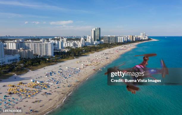 usa. drone flying over miami beach - beach rescue aerial stock pictures, royalty-free photos & images