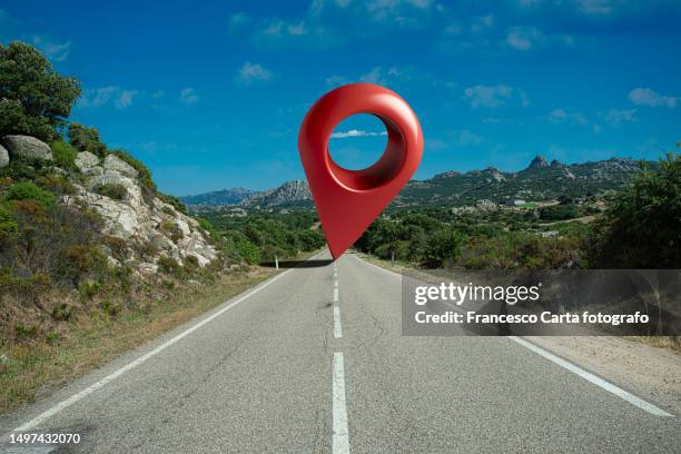 empty asphalt road with a big location map pin - virtual vacations stock pictures, royalty-free photos & images