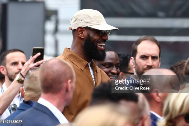 Honorary race starter, LeBron James of the United States looks on prior to waving the flag to start the 100th anniversary of the 24 Hours of Le Mans...