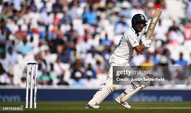 Cheteshwar Pujara of India plays a shot during day four of the ICC World Test Championship Final between Australia and India at The Oval on June 10,...