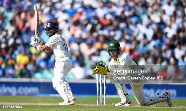 Virat Kohli of India plays a shot as Alex Carey of Australia keeps during day four of the ICC World Test Championship Final between Australia and...