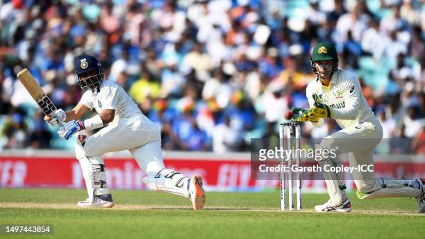 Ajinkya Rahane of India plays a shot as Alex Carey of Australia keeps during day four of the ICC World Test Championship Final between Australia and...