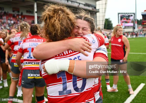 Maud Muir of Gloucester-Hartpury embraces Lleucu George of Gloucester-Hartpury following the Allianz Premier 15s Semi Final match between...