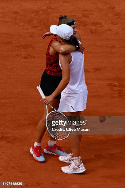 Iga Swiatek of Poland shakes hands with Karolina Muchova of Czech Republic after the Women's Singles Final match on Day Fourteen of the 2023 French...