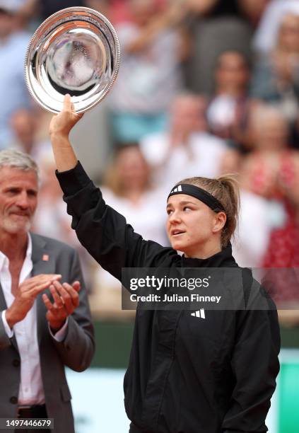 Karolina Muchova of Czech Republic poses with their runners up trophy after defeat to Iga Swiatek of Poland in the Women's Singles Final match on Day...