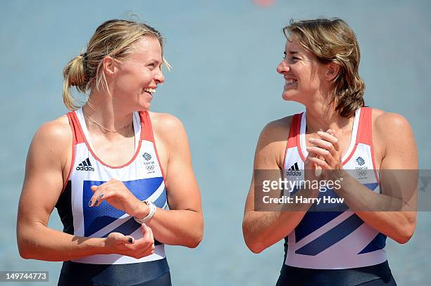 Katherine Grainger and Anna Watkins of Great Britain celebrate before receiving their gold medals during the medal ceremony for the Women's Double...