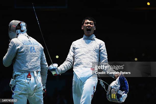 Bongil Gu of Korea celebrates beating Aldo Montano of Italy during the Men's Sabre Team Fencing semifinal on Day 7 of the London 2012 Olympic Games...