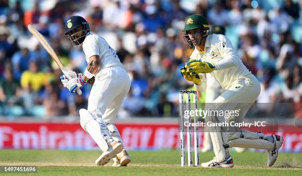 Virat Kohli of India plays a shot as Alex Carey of Australia keeps during day four of the ICC World Test Championship Final between Australia and...