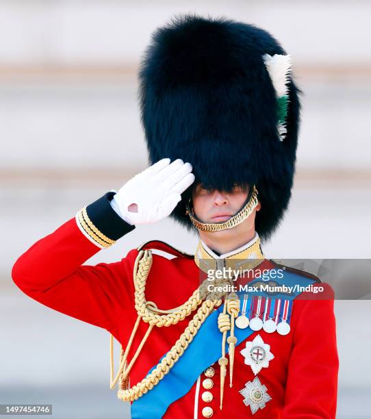 Prince William, Prince of Wales takes the salute outside Buckingham Palace after carrying out The Colonel's Review at Horse Guards Parade on June 10,...