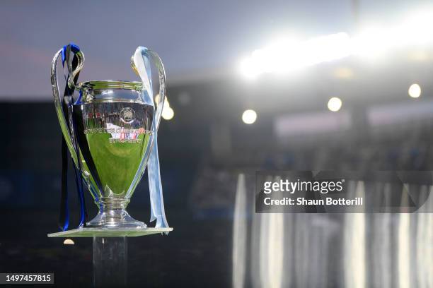The UEFA Champions League trophy is seen on a plinth prior to the UEFA Champions League 2022/23 final match between FC Internazionale and Manchester...