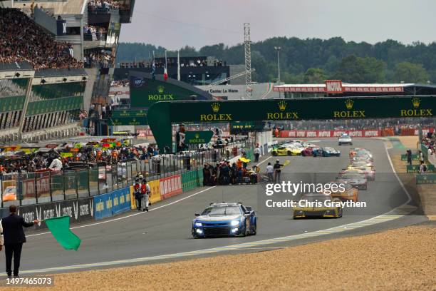 The NASCAR Next Gen Chevrolet ZL1 driven by Jimmie Johnson, Jenson Button and Mike Rockenfeller drives during the 100th anniversary of the 24 Hours...