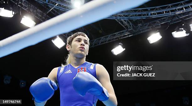 Jeyvier Cintron Ocasio of Puerto Rico arrives in the ring to face Juliao Henriques Neto of Brazil in their round of 16 Flyweight match of the London...