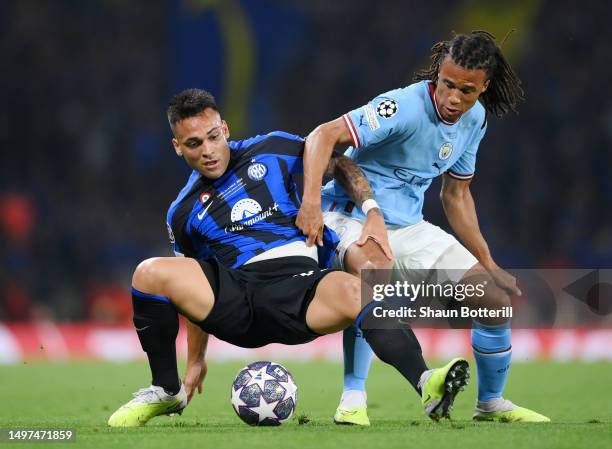 Lautaro Martinez of FC Internazionale and Nathan Ake of Manchester City battle for the ball during the UEFA Champions League 2022/23 final match...