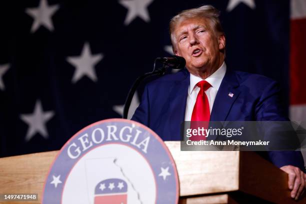 Former U.S. President Donald Trump delivers remarks during the Georgia state GOP convention at the Columbus Convention and Trade Center on June 10,...