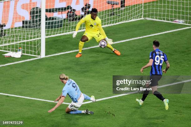 Andre Onana of FC Internazionale saves a shot from Erling Haaland of Manchester City during the UEFA Champions League 2022/23 final match between FC...