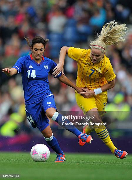 Louisa Necib of France and Lisa Dahlkvist of Sweden battle for the ball during the Women's Football Quarter Final match between Sweden and France, on...