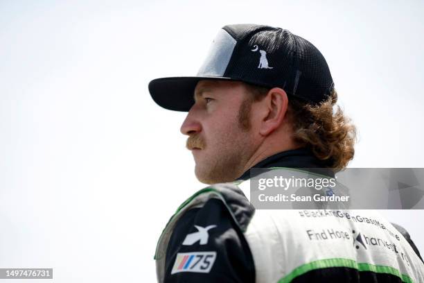 Jeffrey Earnhardt, driver of the ForeverLawn Chevrolet, looks on during qualifying for the NASCAR Xfinity Series DoorDash 250 at Sonoma Raceway on...