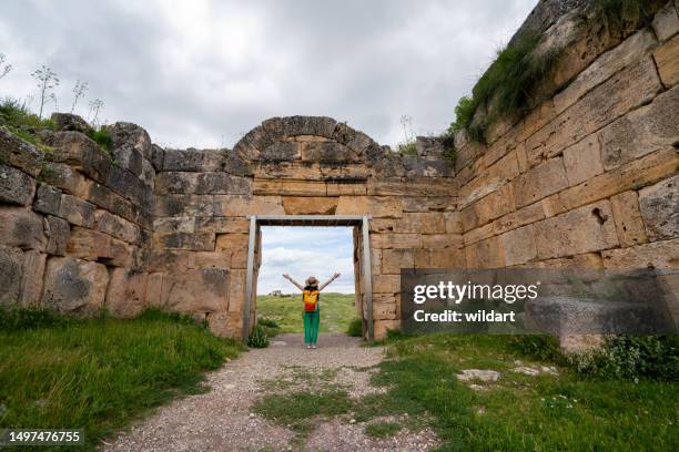 female traveller girl is on blaundus ancient city ruins in ulubey usak turkey - lydia stock pictures, royalty-free photos & images