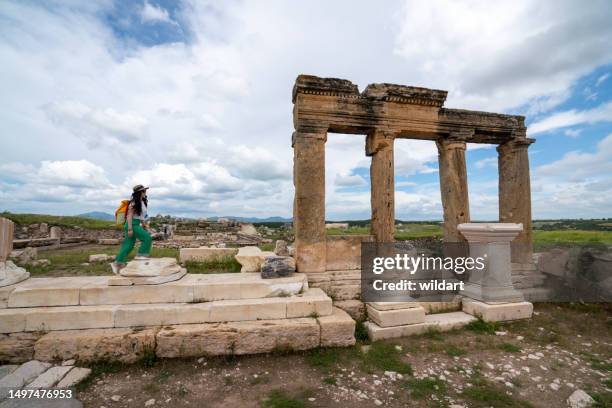 female traveller girl is on blaundus ancient city ruins in ulubey usak turkey - lydia stock pictures, royalty-free photos & images