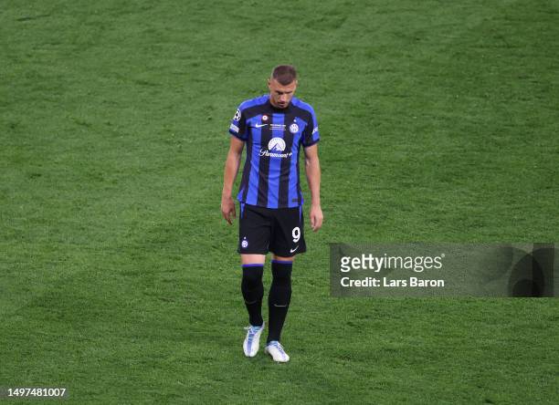Edin Dzeko of FC Internazionale looks dejected as he leaves the pitch after being substituted off during the UEFA Champions League 2022/23 final...