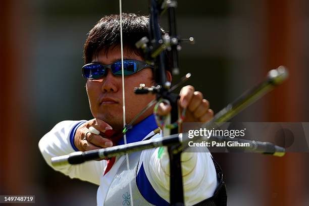 Takaharu Furukawa of Japan competes against Rick Van Der Ven of Netherlands during the Men's Individual Archery Semifinal match on Day 7 of the...